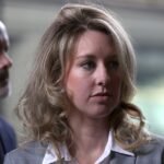 Pretend you’re sitting at Elizabeth Holmes’ desk on this weirdly detailed website